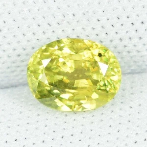 1.25 ct ULTRA RATE GREEN  YELLOW 100% NATURAL SPHENE  OVAL See Vdo BBL - Picture 1 of 3