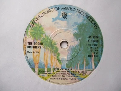 The Doobie Brothers "Eyes Of Silver" Warner Bros UK 7" Single EX - Image 1 of 2