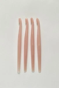 Tupperware Citrus Peelers Set of 4 Pink Pearl New - Picture 1 of 2