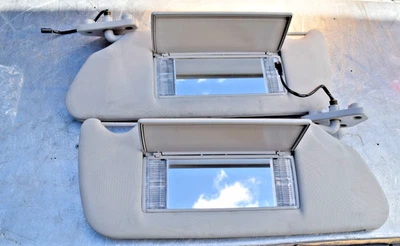 Par de parasoles grises para conductor y pasajero Hummer H3 06-10 con espejos y luces OEM Foto 1 de 4