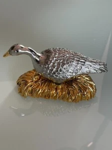 Vintage Solid Metal Sitting Goose figurine with Gold Tone Egg and Hay - Picture 1 of 9