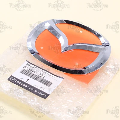 Parachoques delantero genuino OEM Mazda MX-5 MIATA RX-8 logotipo emblema cromado F189-51-731 Foto 1 de 4