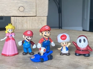Lotto Figurine Super Mario Bros Rospo Auto Pesca Principessa Timido Ragazzo Nintendo Cake Top - Foto 1 di 14