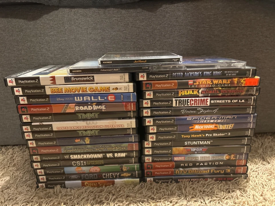 PS2 Game Lot includes 27 PlayStation 2 games and 3 PS1 Games - Image 1 of 1