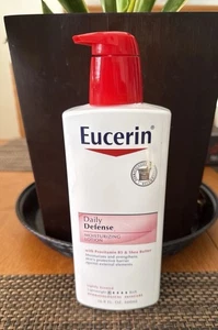 Eucerin DAILY DEFENSE Lozione Idratante 16,9 fl. Oz HTF - Foto 1 di 2