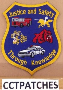 JUSTICE AND SAFETY THROUGH KNOWLEDGE (POLICE FIRE) SHOULDER PATCH - Picture 1 of 2
