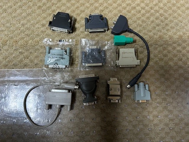 New P/N 37260 25-Pin Female to DB 9 Male Plug and 10 other used assorted Plugs - Image 1 of 1