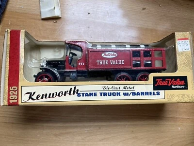 🚚1925 ERTL KENWORTH STAKE TRUCK w/BARRELS BANK TRUE VALUE 1/34 DIE-CAST VINTAGE - Image 1 of 4