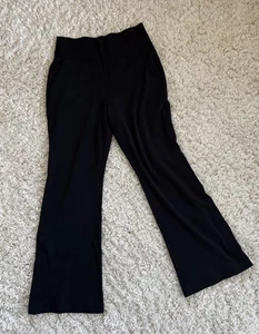 Pantalones acampanados de yoga atléticos para mujer Athleta con bolsillos con cremallera talla pequeña - Imagen 1 de 6