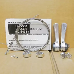 New-Old-Stock Shimano 7-Speed Index Shifters (Model SL-A400) w/Curved Spacers - Picture 1 of 8