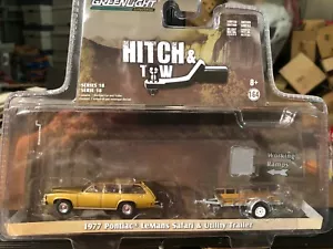 1/64 GREENLIGHT HITCH & TOW 1977 PONTIAC LEMANS SAFARI WAGON & UTILITY TRAILER - Picture 1 of 3