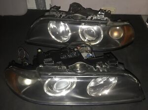 01 02 03 BMW E39 525i 530i 540i M5 OEM L+R HID XENON HEADLIGHTS NEW ADJUSTERS