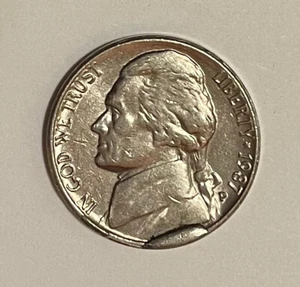 1987P Jefferson nickel cud die break error, (CU-5C-1987P-01 St. B & 02) circ NR - Picture 1 of 2