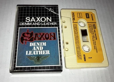 SAXON Denim and Leather Cassette Paper Labels Fama EMI Spain import UK Metal Foto 1 de 4