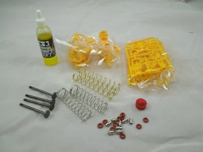 TAMIYA MONSTER BEETLE SHOCK SET SHOCKS SPRINGS DAMPNERS BLACKFOOT yellow - Image 1 of 4