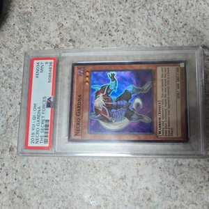Yugioh- 1X Necro Gardna - Super Rare - 1st Edition - TAEV-EN012 - PSA 9✨️ RARE - Picture 1 of 2