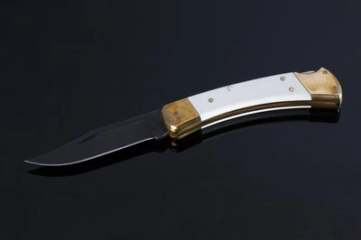 2016 Buck 110 Folding Hunter Knife White Micarta Scales Black Blade Brass - Image 1 of 4