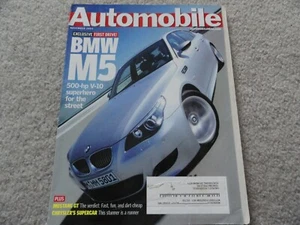 2005 BMW M5 / 2005 Ford Mustang GT   Automobile Magazine - Foto 1 di 1