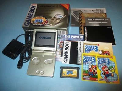 Nintendo Game Boy Advance SP Gold System in Box Toys R Us + Super Mario 3 Game - Image 1 of 4