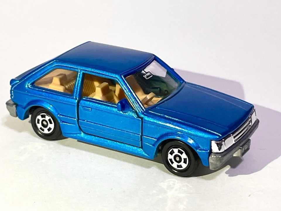 TOMICA 4 - MAZDA FAMILIA TURBO PERSONALIZADO PINTADO COMO NUEVO MUY BUEN ESTADO SOLO 1 Me gusta en eBay Foto 1 de 4
