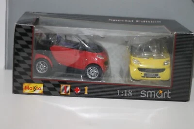 Maisto smart for two, (1:18), red/yellow, (Special Edition), (31852),smoke smell - Image 1 of 3