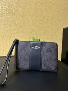 Coach Eckreißverschluss Signature Handgelenktasche gold/walnuss/schwarz - Bild 1 von 3