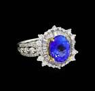 Elegant Vivid Blue Oval Cut Sapphire With Sparkling CZ 3.26TCW Engagement Ring