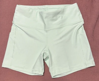 Athleta Interval Stash 5" Mint Green Biker Shorts Size L Women - Image 1 of 4