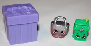CAJA REGALO REGALO SHOPKINS + 2 FIGURAS LISA LITTER Y EQUIPAJE PERDIDO BOLSO PUENTE - Imagen 1 de 4