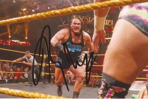 WWE WRESTLING: RHYNO SIGNED 6x4 ACTION PHOTO+COA **PROOF** - Picture 1 of 2