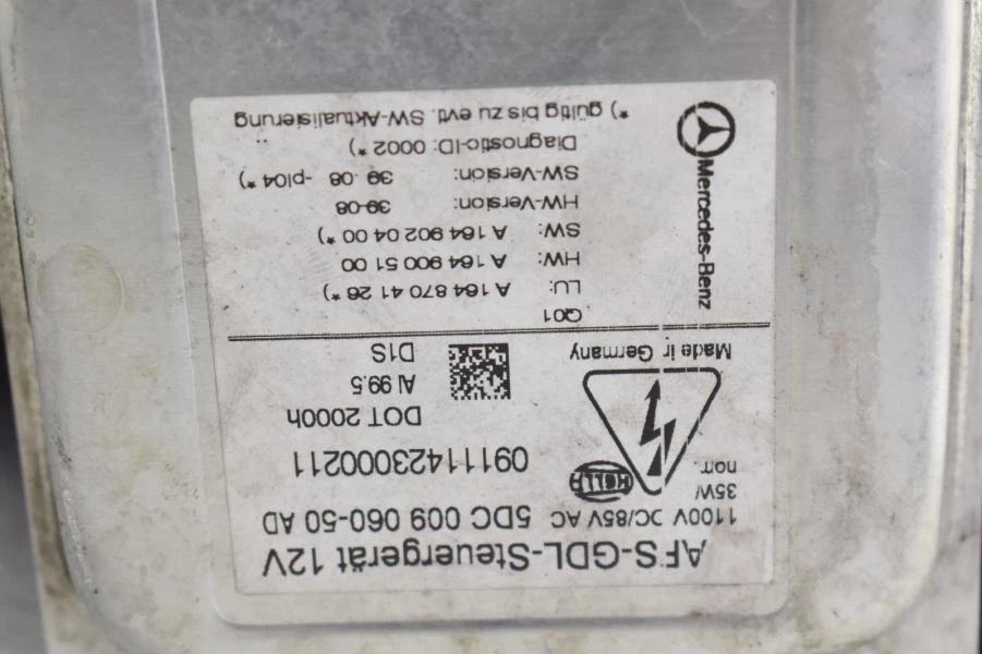 Conjunto de faros de pasajero derecho Mercedes ML320 2010 fabricante de equipos originales usados, pestaña rota Foto 1 de 4