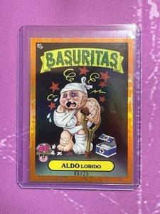 2025 TOPPS Gpk Worst 40th Global Takeover Basuritas Aldo Lorido Orange /25 - Picture 1 of 1