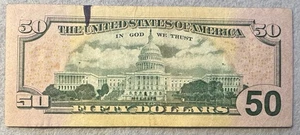 2004 - $50 Slight Ink Error on Reverse - Picture 1 of 2