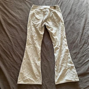 Pantalones de pana acampanados plateados vintage Y2K etiquetados 29 medida como un 28! - Imagen 1 de 5