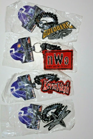 Lot of 4 WCW World Championship Wrestling Key Rings 1999 - Goldberg NWO Nash WCW Cover
