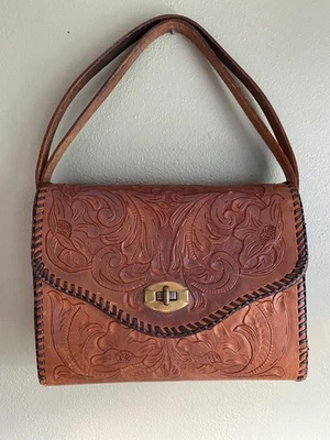 Hand tooled leather handbag adjustable strap and brass twist lock - Image 1 of 4