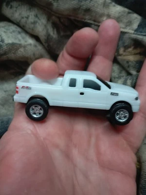 ERTL Ford Motor Company 2004 F-150 FX4 Pickup Truck -  White-3In…92.  C34 - Image 1 of 4