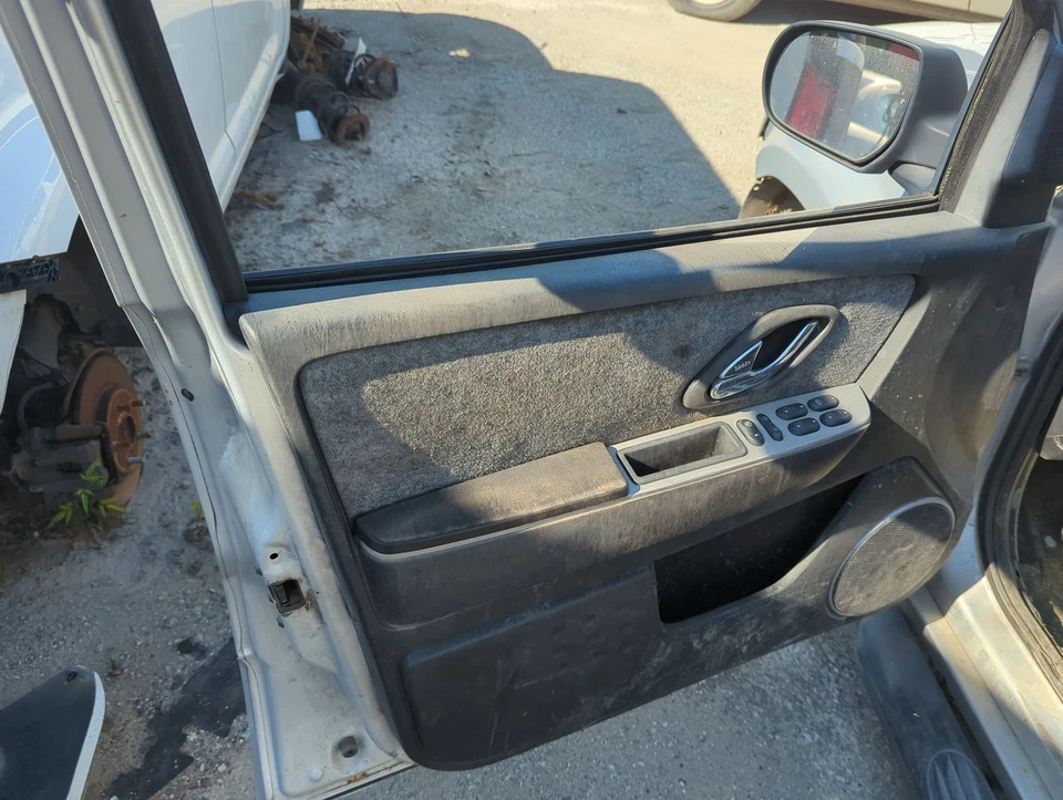 Mercury Mariner 2006 panel interior del conductor delantero izquierdo KMUCR Foto 1 de 1