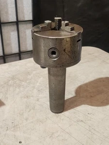 Mandrino per tornio a scorrimento autocentrante Bison 4" 3 ganasce foro passante 3/4" - Foto 1 di 14