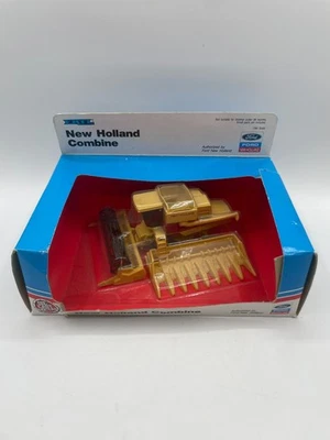 1/64 New Holland Combine, Red Stripe, W/Corn & Grain Heads, ERTL 815 - Image 1 of 4