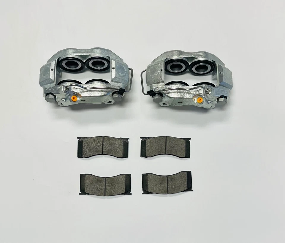 1965-69 Lincoln Pair Front Brake Calipers with Disc Pads NEW - Image 1 of 1