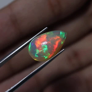 6 Cts 17x10.6 MM Natural AAAA Flashy Rainbow Fire Ethiopian Opal Pear Cabochon - Picture 1 of 13