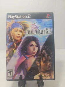 Final Fantasy X-2 (Sony PlayStation 2, 2003) CIB, etichetta nera, testato, funzionante. - Foto 1 di 3