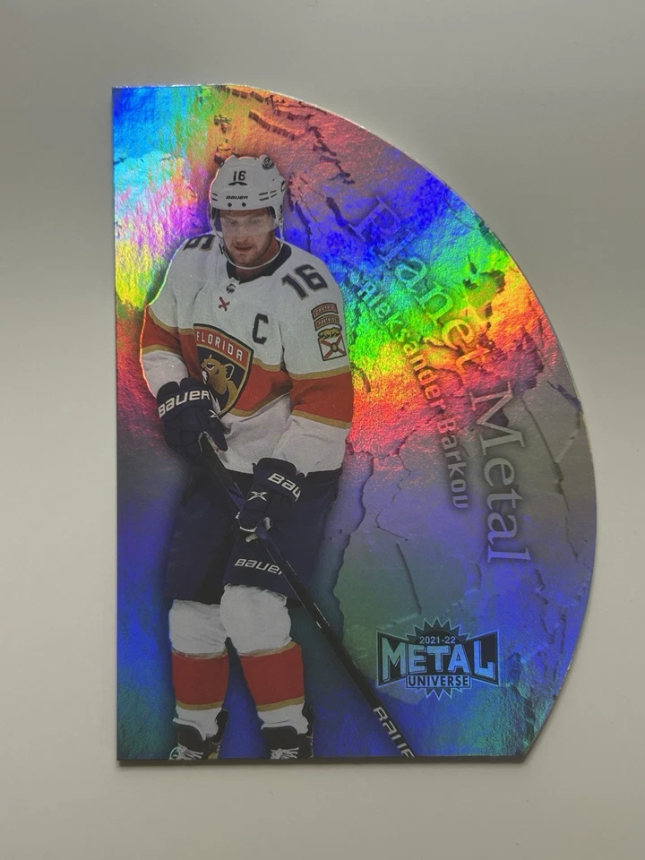 2021-22 SkyBox Metal Universe Planet Metal Aleksander Barkov #PM23 - Image 1 of 4