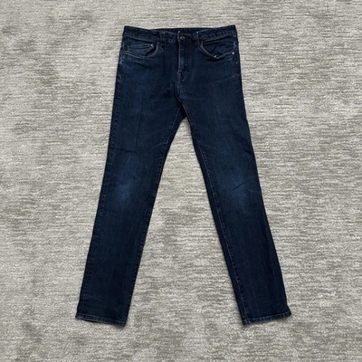 Pantalones de mezclilla elásticos de algodón orgánico calce ajustado lavado oscuro azul 33x32 prAna para hombre Foto 1 de 4