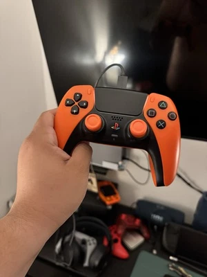 PlayStation DualSense - Orange Edition With HALL EFFECT & Clicky face/Triggers - Image 1 of 4