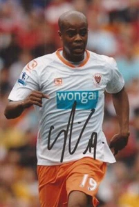 BLACKPOOL: LUDOVIC SYLVESTRE SIGNED 6x4 ACTION PHOTO+COA - Picture 1 of 1