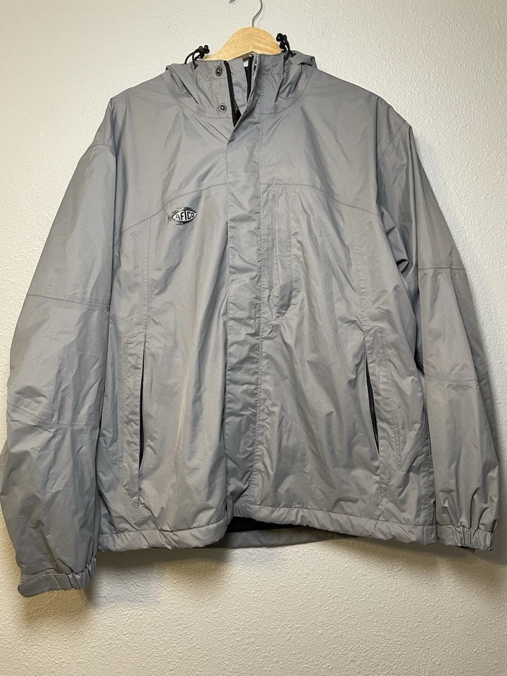 Chaqueta cortavientos de pesca impermeable de nailon azul para hombre Aftco talla pequeña Foto 1 de 4