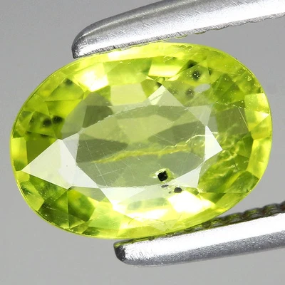 0.77ct 6.8x4.9mm Oval Natural Untreated Green Shiny Peridot Gemstone Myanmar - Image 1 of 4