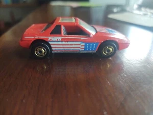 Vintage 1984 Hot Wheels Hot Ones Diecast 1/64 Red Patriotic Flag Fiero Gold Rim - Picture 1 of 4